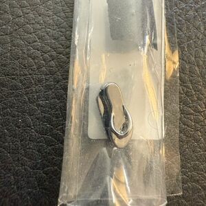 KEEP Collective silver flip flop charm.